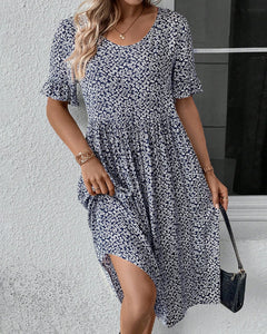 Robe élégante à col rond et imprimé floral