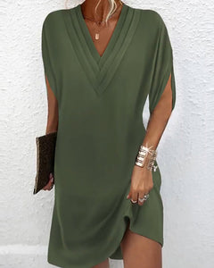 Robe élégante à manches fendues de couleur unie