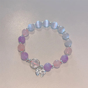 Bracelet imitation œil de chat cristal de papillon