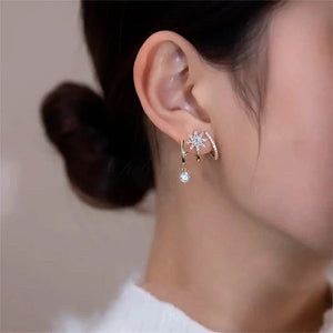 Boucles d'oreilles étoile à huit branches
