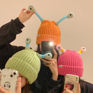 Petit bonnet de monstre lumineux
