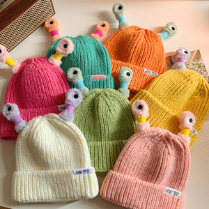 Petit bonnet de monstre lumineux