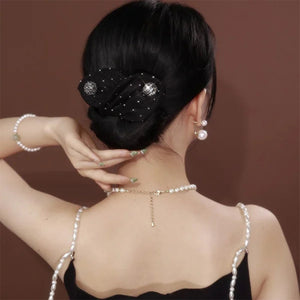 Fleurs brodées à la main Chignon de Deft