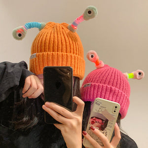 Petit bonnet de monstre lumineux