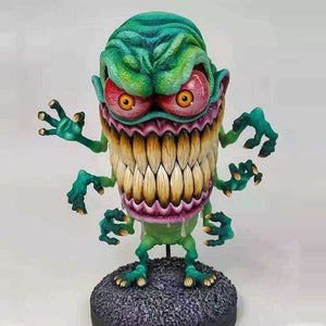 Statues de monstre à grande bouche en colère