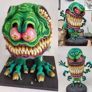 Statues de monstre à grande bouche en colère