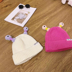 Petit bonnet de monstre lumineux