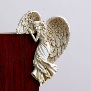 Décoration cadre de porte ailes d'ange en résine