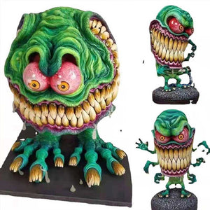Statues de monstre à grande bouche en colère