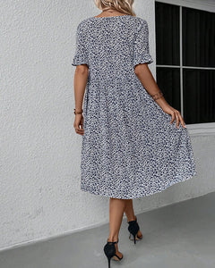 Robe élégante à col rond et imprimé floral