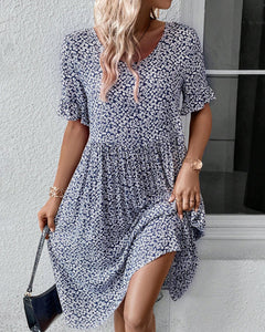 Robe élégante à col rond et imprimé floral