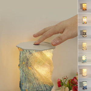 Lampe à livres rotative