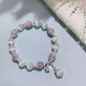 Bracelet imitation œil de chat cristal de papillon